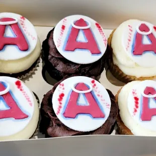 Assorted cupcakes (carrot cake, chocolate, and vanilla)