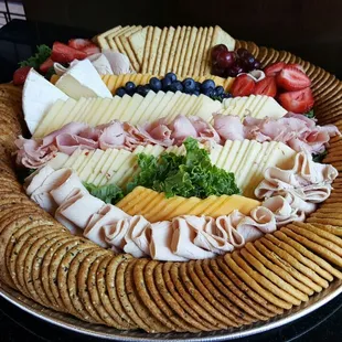 Cheese platter with all-natural deli meats and variety crackers
