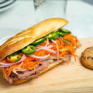 Classic Num Pang: Cambodian sandwich with pickled veggies and premium roast beef and ham.