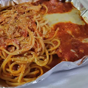 a plate of spaghetti and sauce