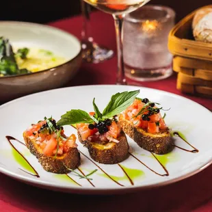 Bruschetta &amp; Burrata: Diced tomatoes, garlic, and balsamic pearls, paired with creamy burrata cheese on crispy toast.