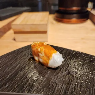 Shrimp topped with garlic uni miso butter