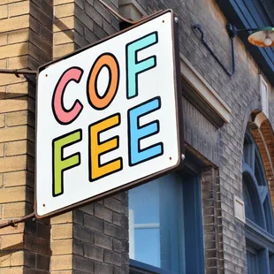a sign on the side of a building