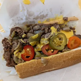 The Works with whiz and hot peppers