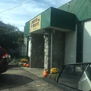 a car parked in front of a building