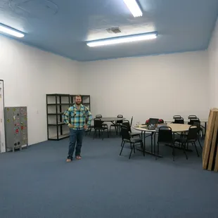 Owner, Dusty Ochoa, in the middle of a remodel in the miniatures room.