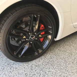 a closeup of a tire on a white car
