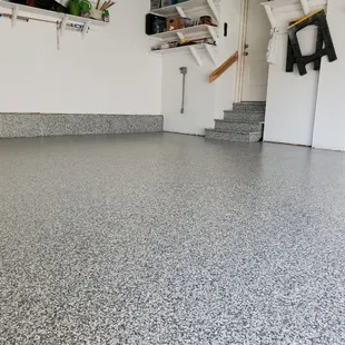 Recently completed Amazing Garage Floor in Lenexa, KS. Installed in 12 day-park on 12 hours after completion.