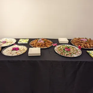 a table with a variety of appetizers