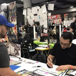 Ask the artists questions while they draw!