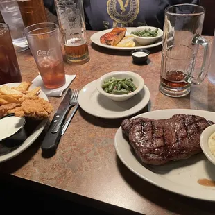 Delicious New York strip steak and salmon. Never leave disappointed.