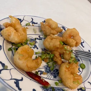 Remainder of my salt and pepper prawns. Sooooooo good. Not to much batter like other places.