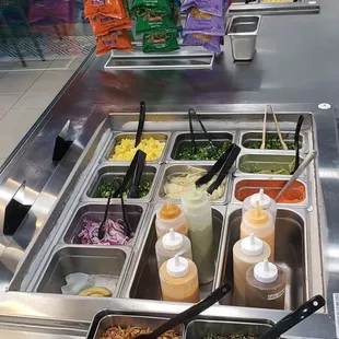 a variety of food items in a buffet