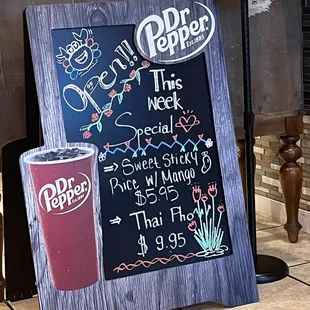 a menu and a drink