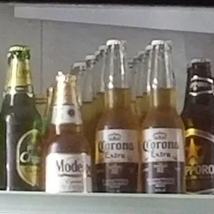 Choice of: Singha, Chang Thai beers, Sapporo, Modelo, Corona