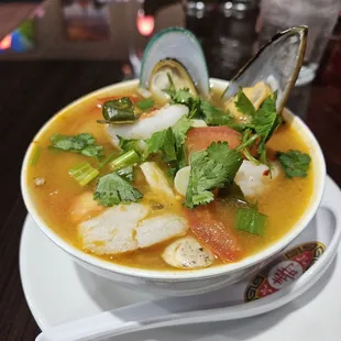 Bowl of tom yum w seafood.