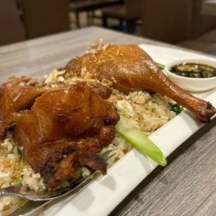 a plate of chicken and rice