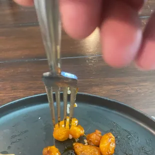 So hard the fork can&apos;t even penetrate the orange chicken