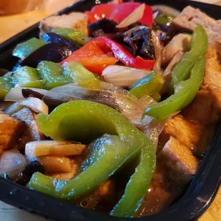 Ginger stir fry, vegan w/tofu ($16). Overcooked vegetables, heavy on the ginger.