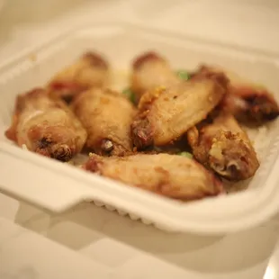 chicken wings in a plastic container
