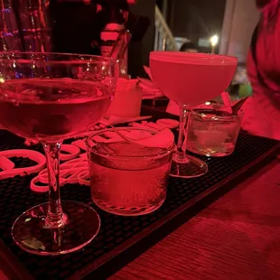 a glass of wine on a tray