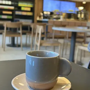 Double Espresso with interior in background