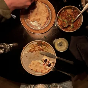 Clay Bread , Herbed Raita, Chili Crisp, Amba Mini, Spicy Cauliflower,