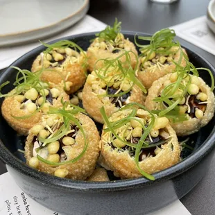 crispy puris potato salad, zhug raita, tamarind, green onion (VEG) -- 13