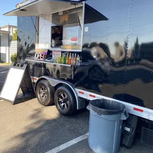 a food truck parked in a parking lot