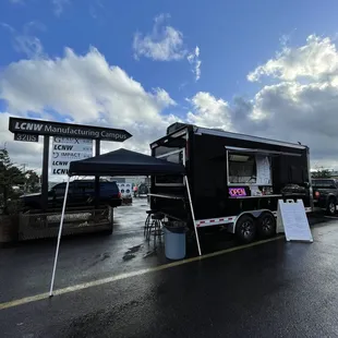 a food truck parked in a parking lot