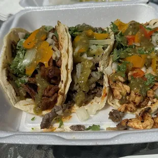 Steak, chicken and pork tacos