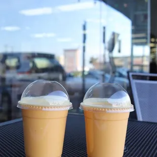 two cups of coffee on a table