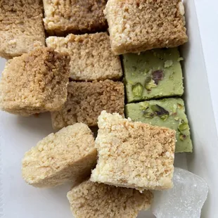 Indian sweets (mithai) - pistachio burfi, and milk cake $13 a lb.