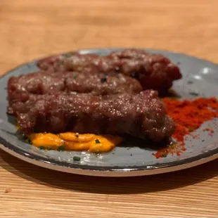 Cevapi Balkan Kebab with roasted pepper and feta cheese emulsion