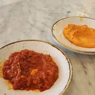 Ajvar on the left . Urnebes on the right