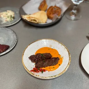 Cevapi 'Balkan Kebab' (house-made  beef sausages served with rosted pepper &amp; feta cheese emulsion)