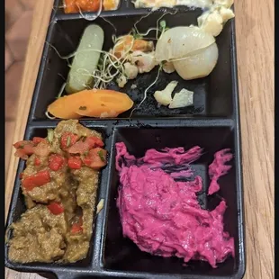 Spread tray with Olivier, Ajvar, White Bean Hummus, Beet Tzatziki and Veggies