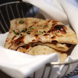 Garlic naan ($6.95) - Unleavened bread topped with fresh garlic and coriander. Good! Texture is really soft.