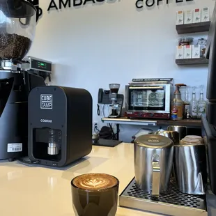 a cup of coffee on a counter