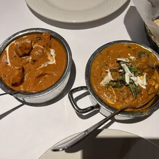 two bowls of food on a table