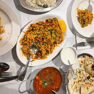 a variety of dishes of food