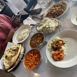 1. Vegetable Pakora Full Plate  43. Aloo Matter  55. Chicken Karahi  99. Garlic Naan