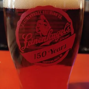 Leinie's 150th anniversary lager in their commemorative glass.