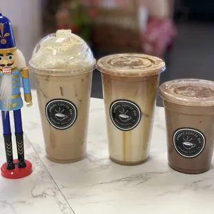 a nutcracker and iced coffee