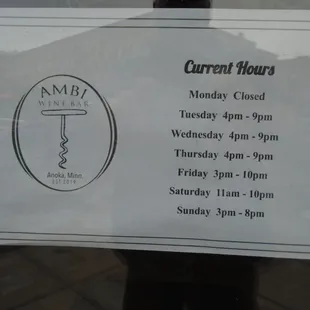 Hours of operation, front entry door.