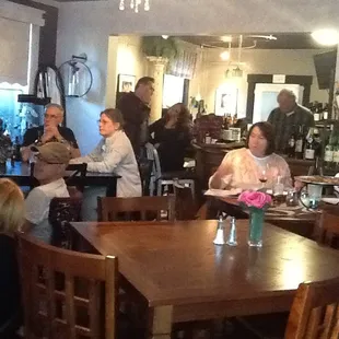 a group of people sitting around a table