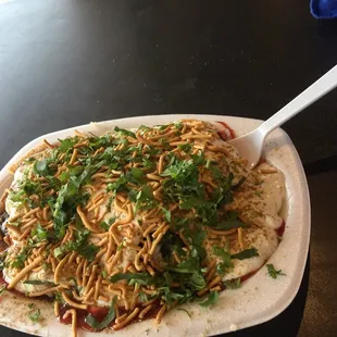 Chat Papdi is cool yoghurt &amp; spicy green relish, onion and a sweet chutney that reminded me of strawberry preserves.  Puris may have wheat.