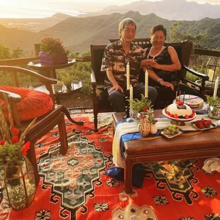 Lounge setup, florals and decorations by Ambient Rentals. Venue: Camp Palehua