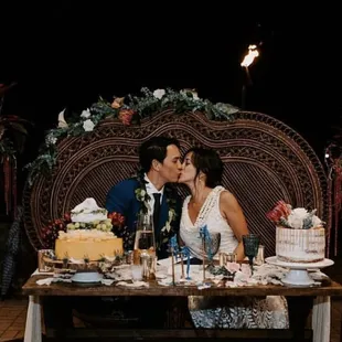 Wedding Photos. Sweetheart Table. Dark Rattan Double Peacock Chair.