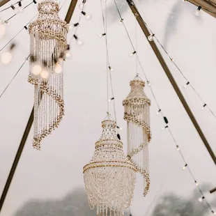Wedding Decor. Wedding Rentals. Party Decor. Party Rentals. Hanging Shell Chandeliers Installation.